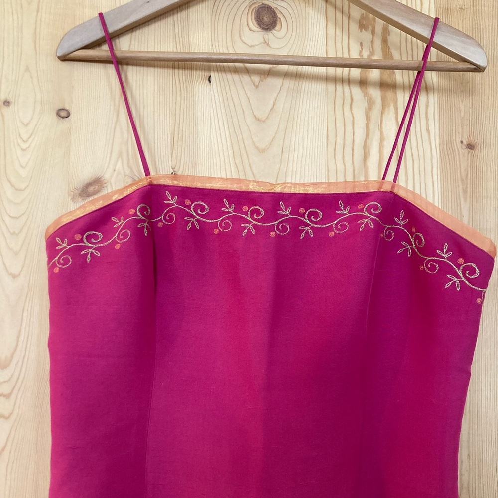 A 100% silk lined top with beautiful details on top.